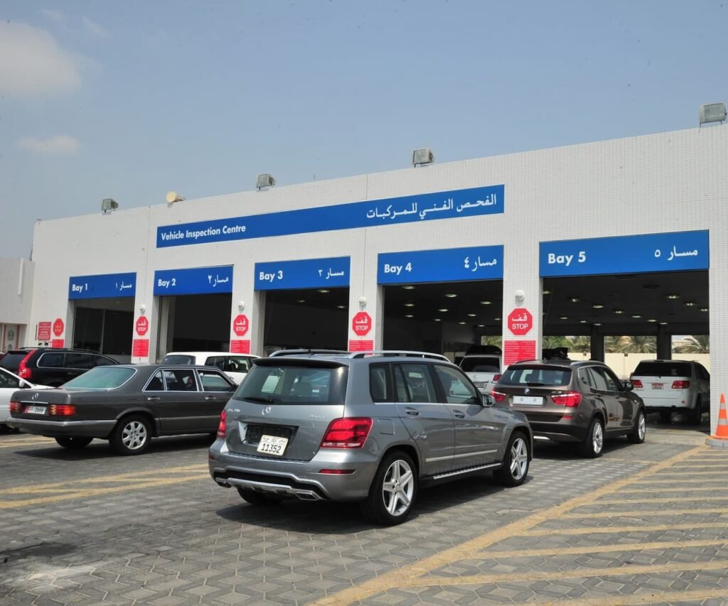 Vehicles are entering the vehicle inspection center in five queues.